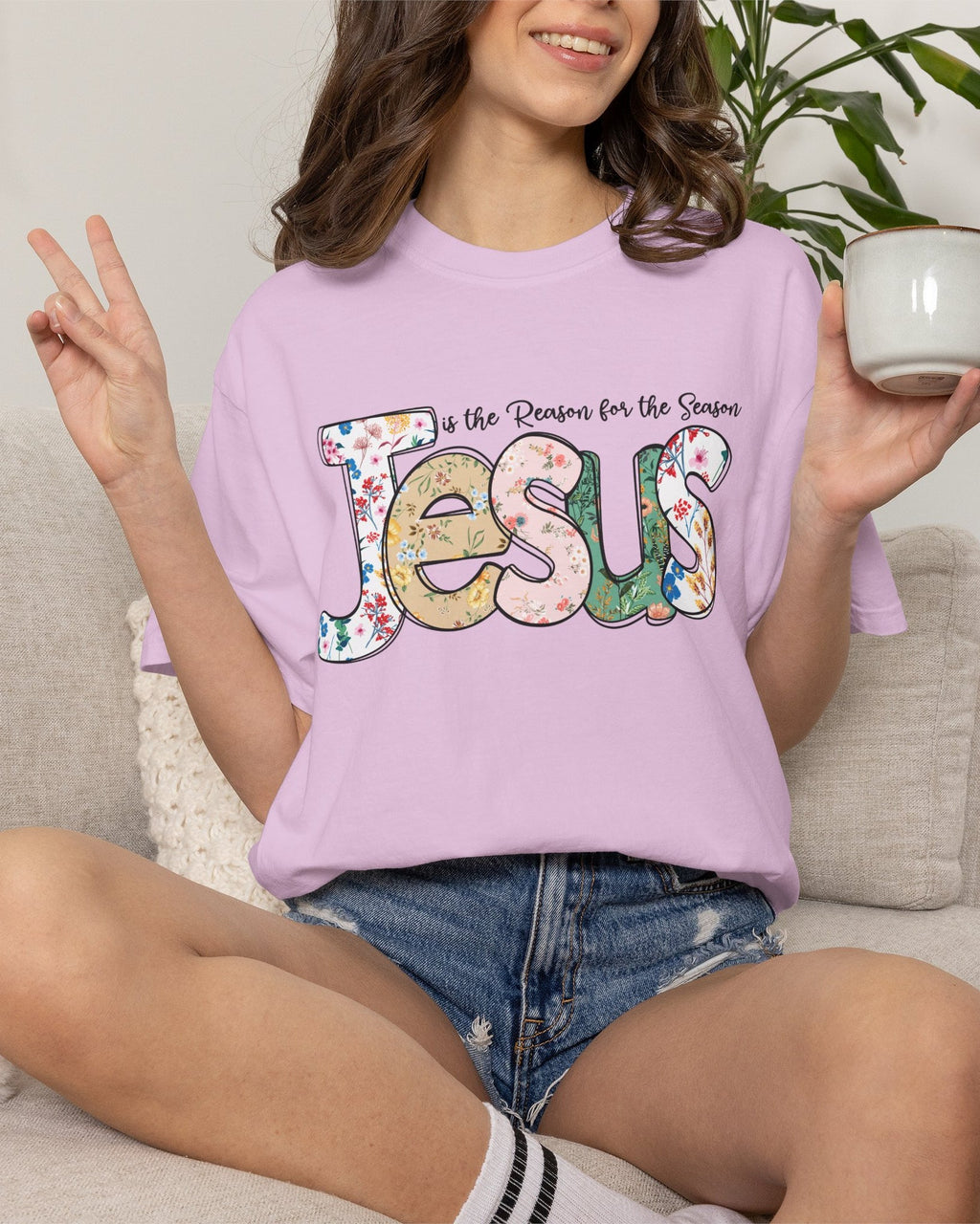 Jesus Is the Reason for the Season Floral Tee | Worn By Faith lifestyle model wearing Worn By Faith Christian graphic tee