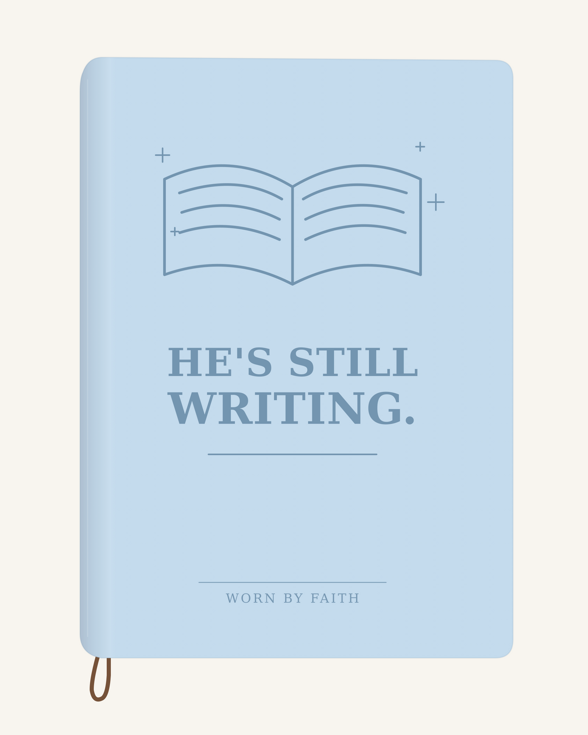 He's Still Writing — A6 Engraved Scripture Journal in light blue; smooth-spine tone-on-tone laser-engraving mockup